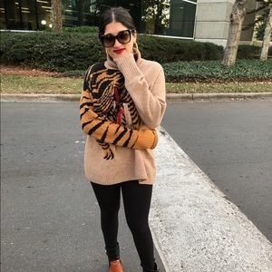 Oversized chunky tiger turtleneck